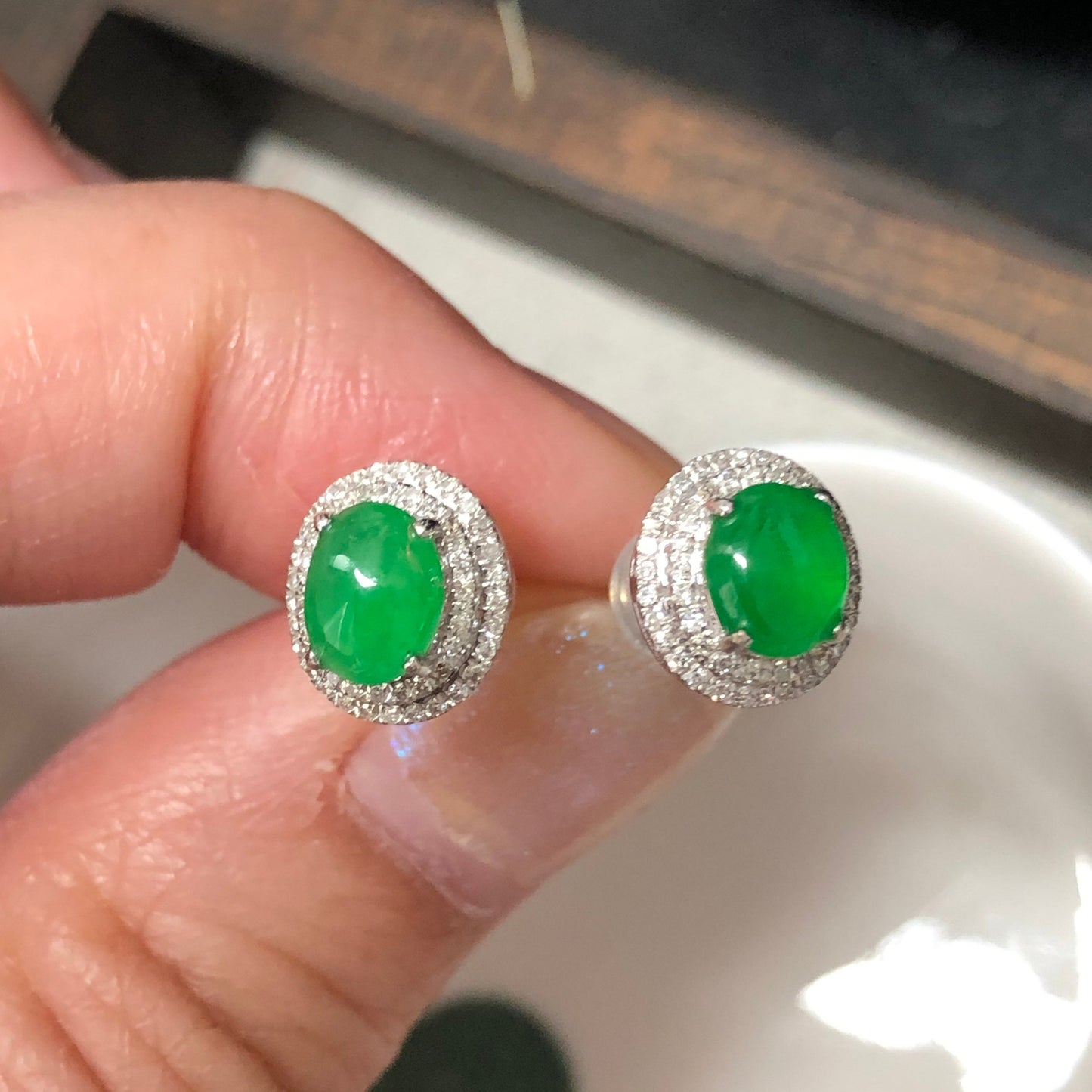 18K Grade A Icy Yang Green Jadeite Jade Oval Cabochon shaped earrings set on 18K white Gold