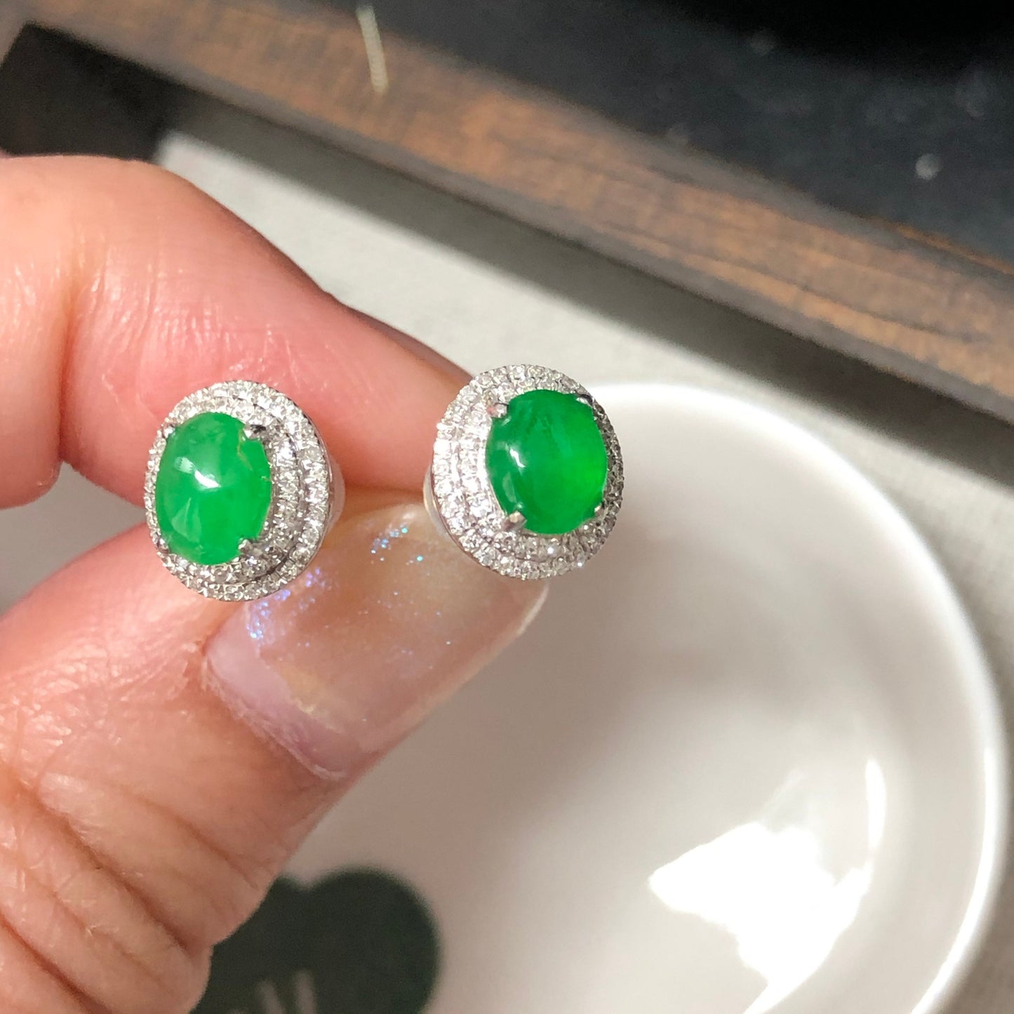 18K Grade A Icy Yang Green Jadeite Jade Oval Cabochon shaped earrings set on 18K white Gold