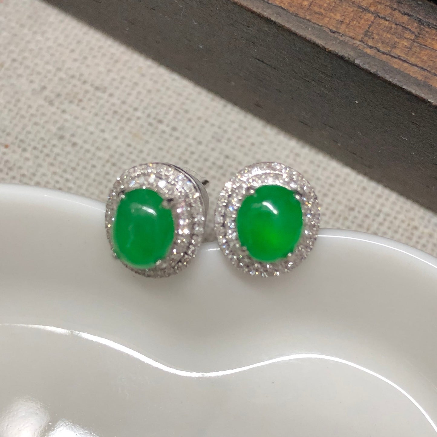 18K Grade A Icy Yang Green Jadeite Jade Oval Cabochon shaped earrings set on 18K white Gold