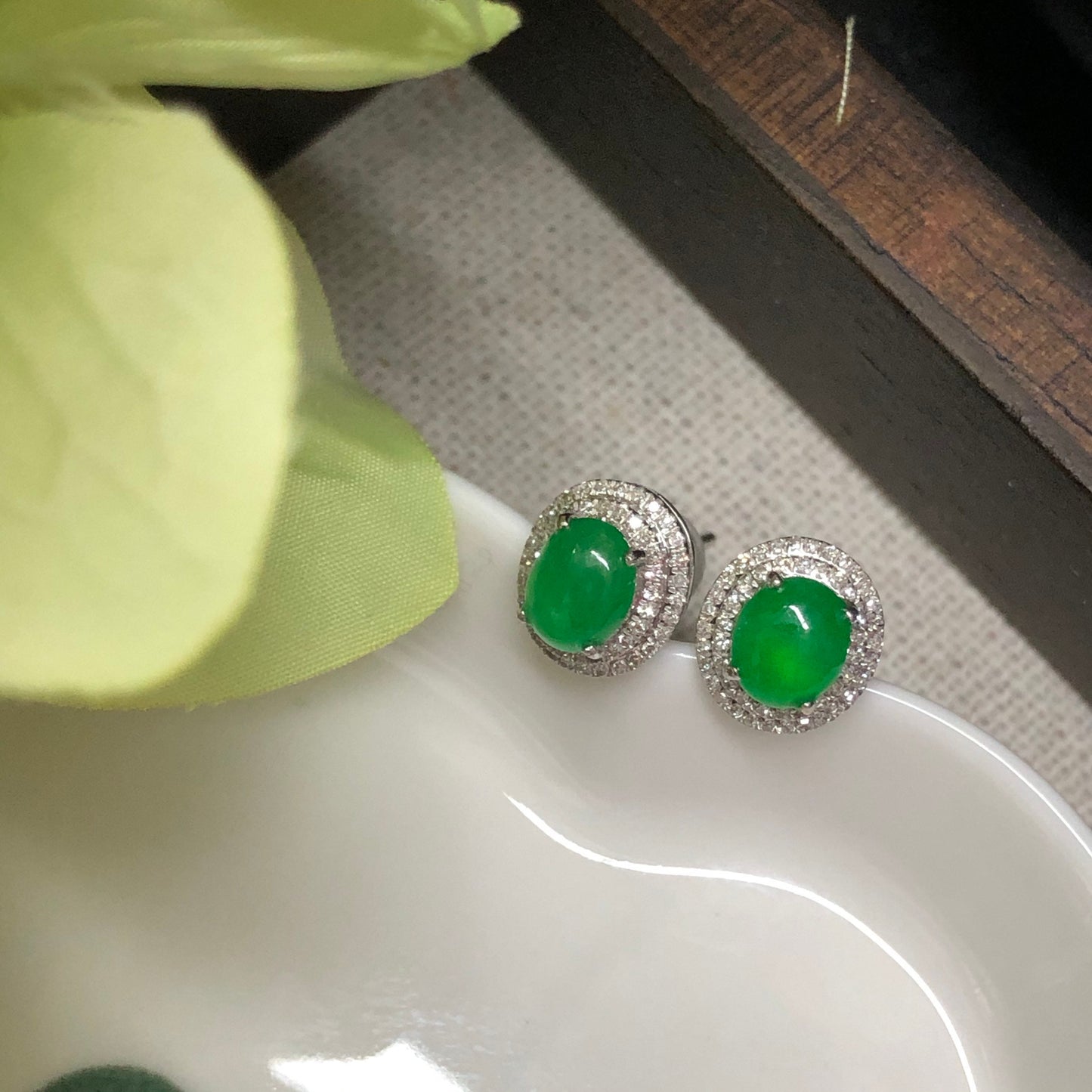 18K Grade A Icy Yang Green Jadeite Jade Oval Cabochon shaped earrings set on 18K white Gold