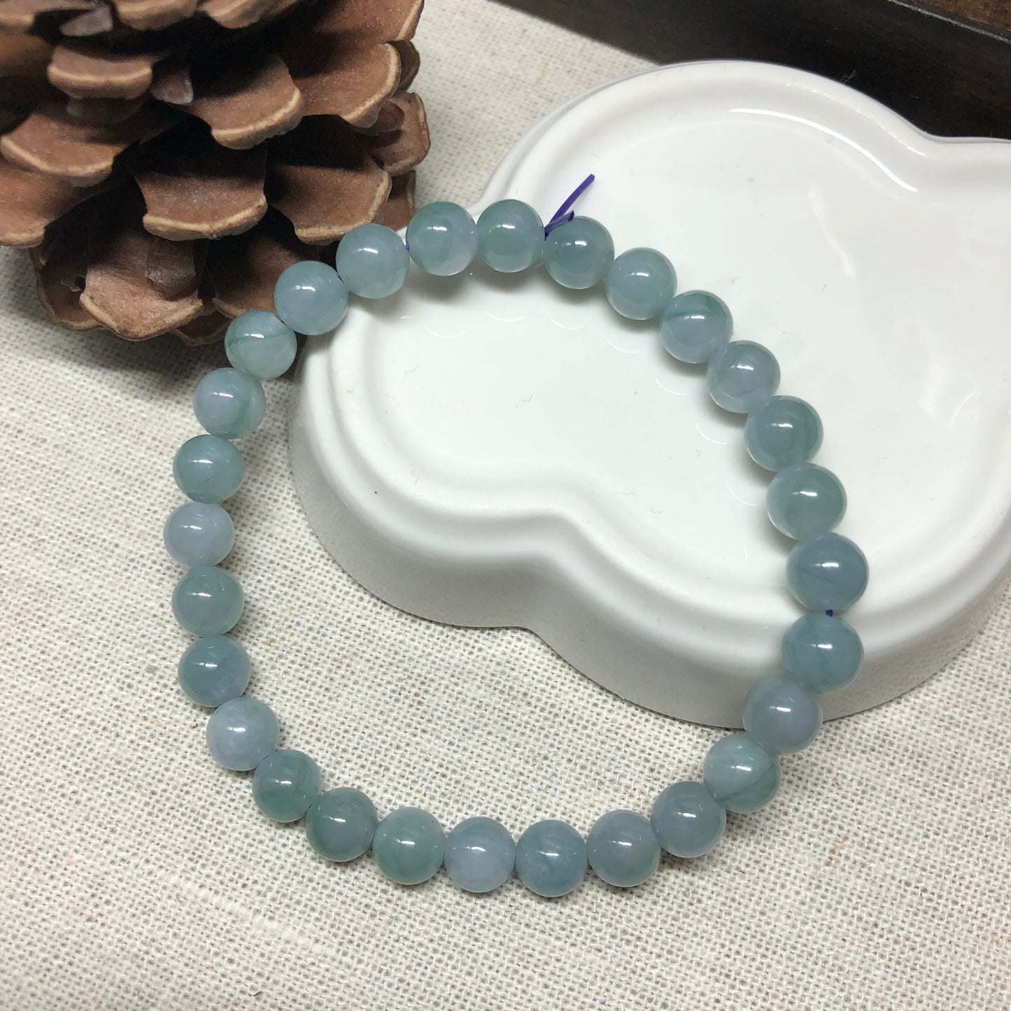 6.6 mm Grade A Icy Glutinous Sky Blue with Green Float Flowers Jadeite Jade Bead Bracelet 26 pcs.