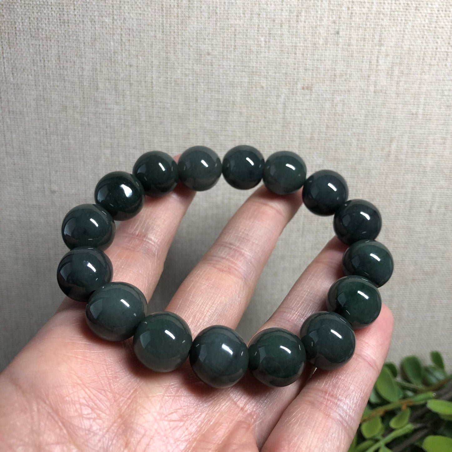 13 mm Grade A Olive Green Jadeite Jade Bead Bracelet 16pcs.