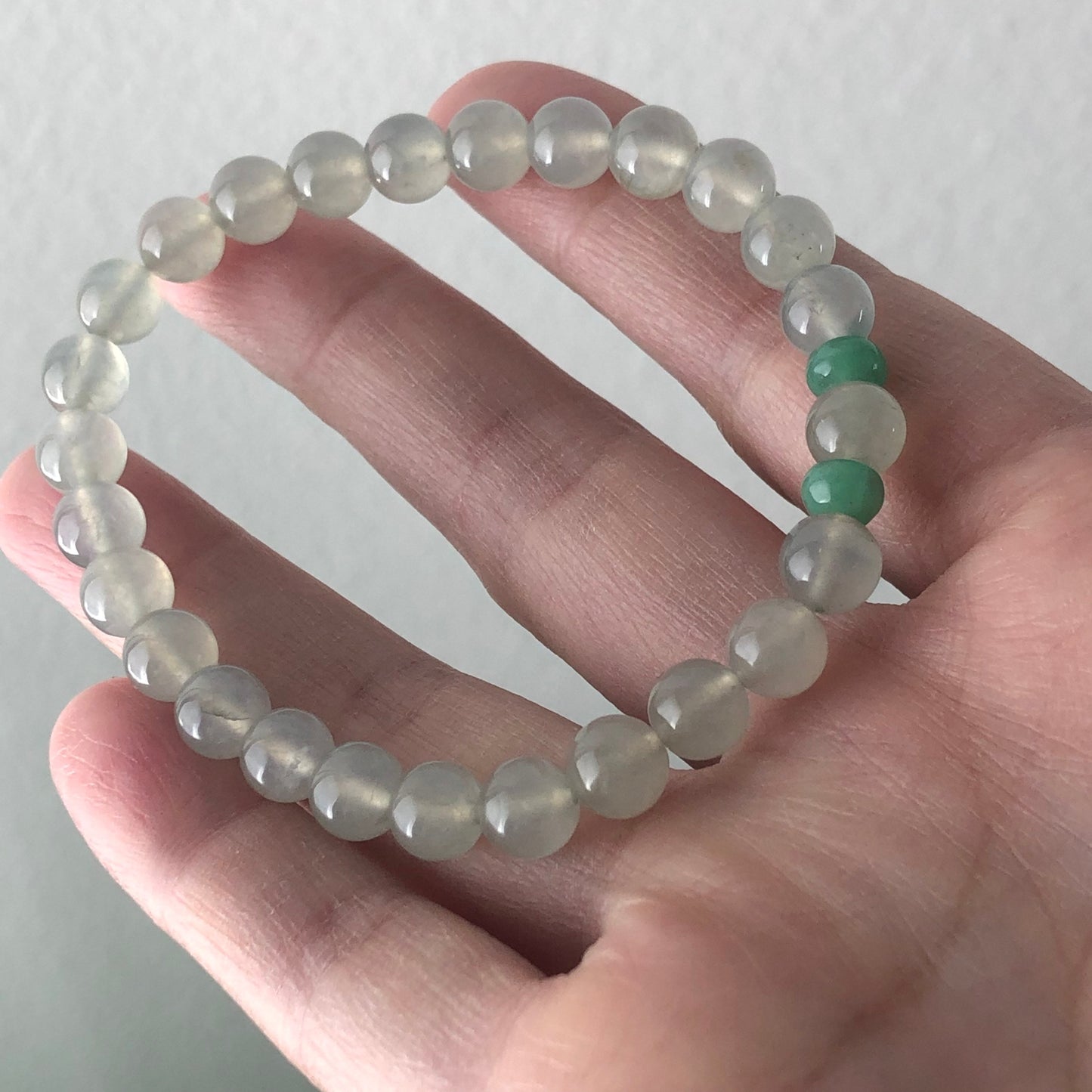 SALE: Jade Jadeite 7 mm Icy Tint Round Bead Bracelet 26 pcs.