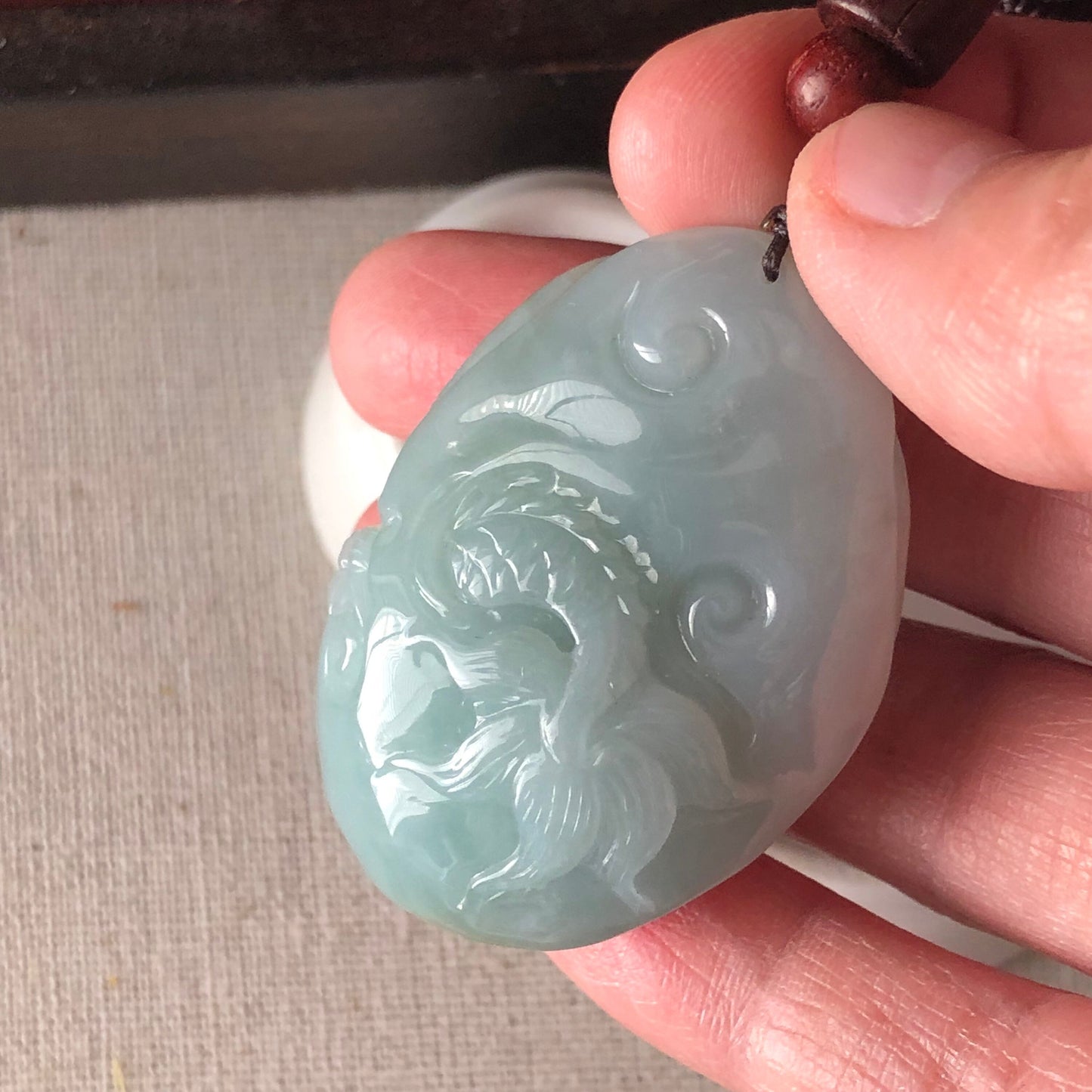 44.6 Icy Sky Blue Jadeite Jade Carved Ruyi Dragon Tail Pendant