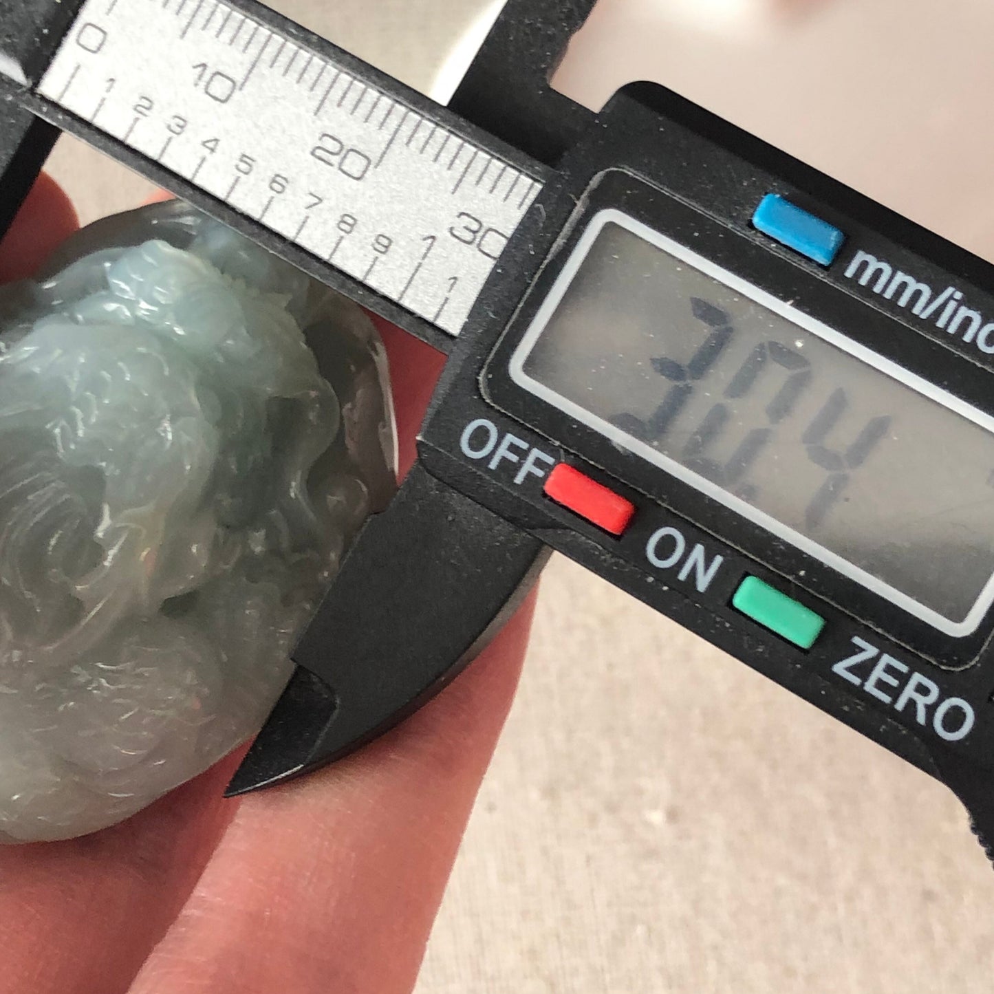 44.6 Icy Sky Blue Jadeite Jade Carved Ruyi Dragon Tail Pendant
