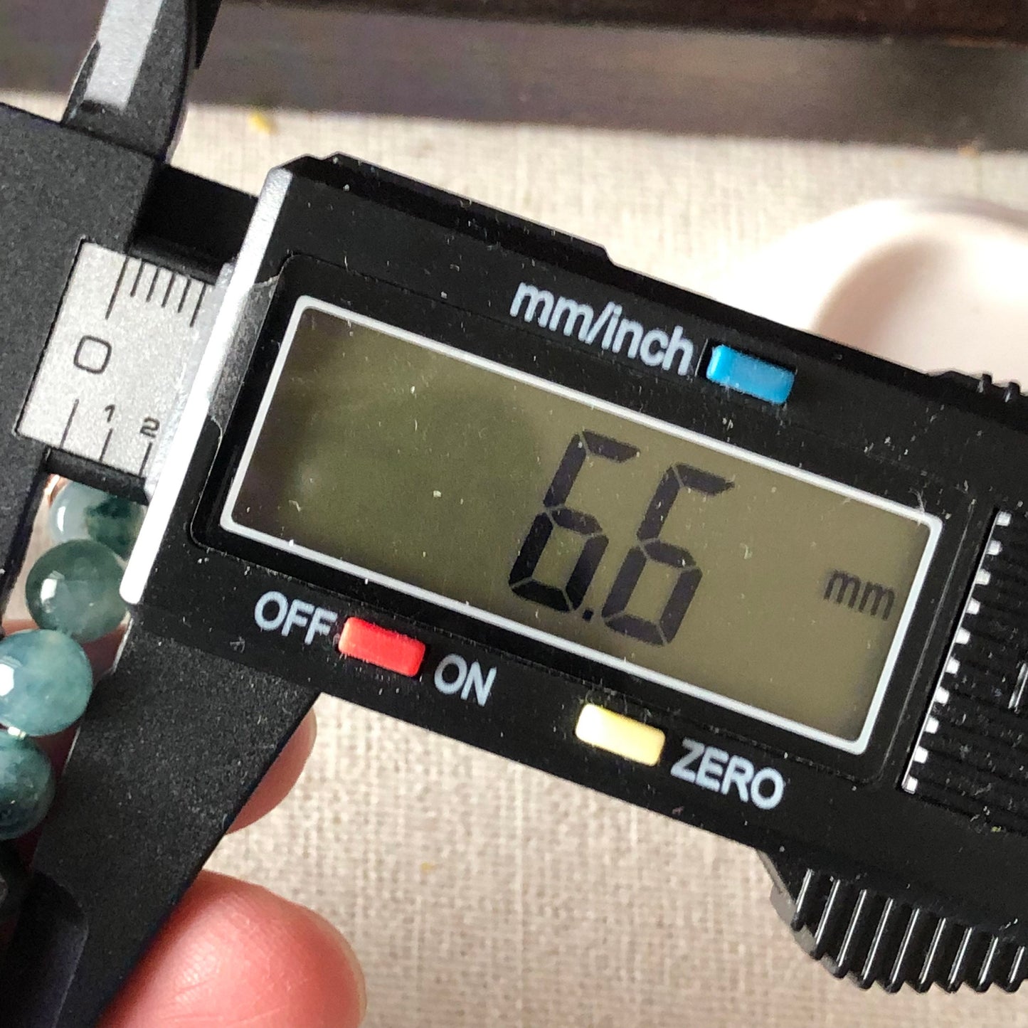 6.6 mm Grade A Icy Green Float Flowers Jadeite Jade Bead Bracelet 29 pcs.