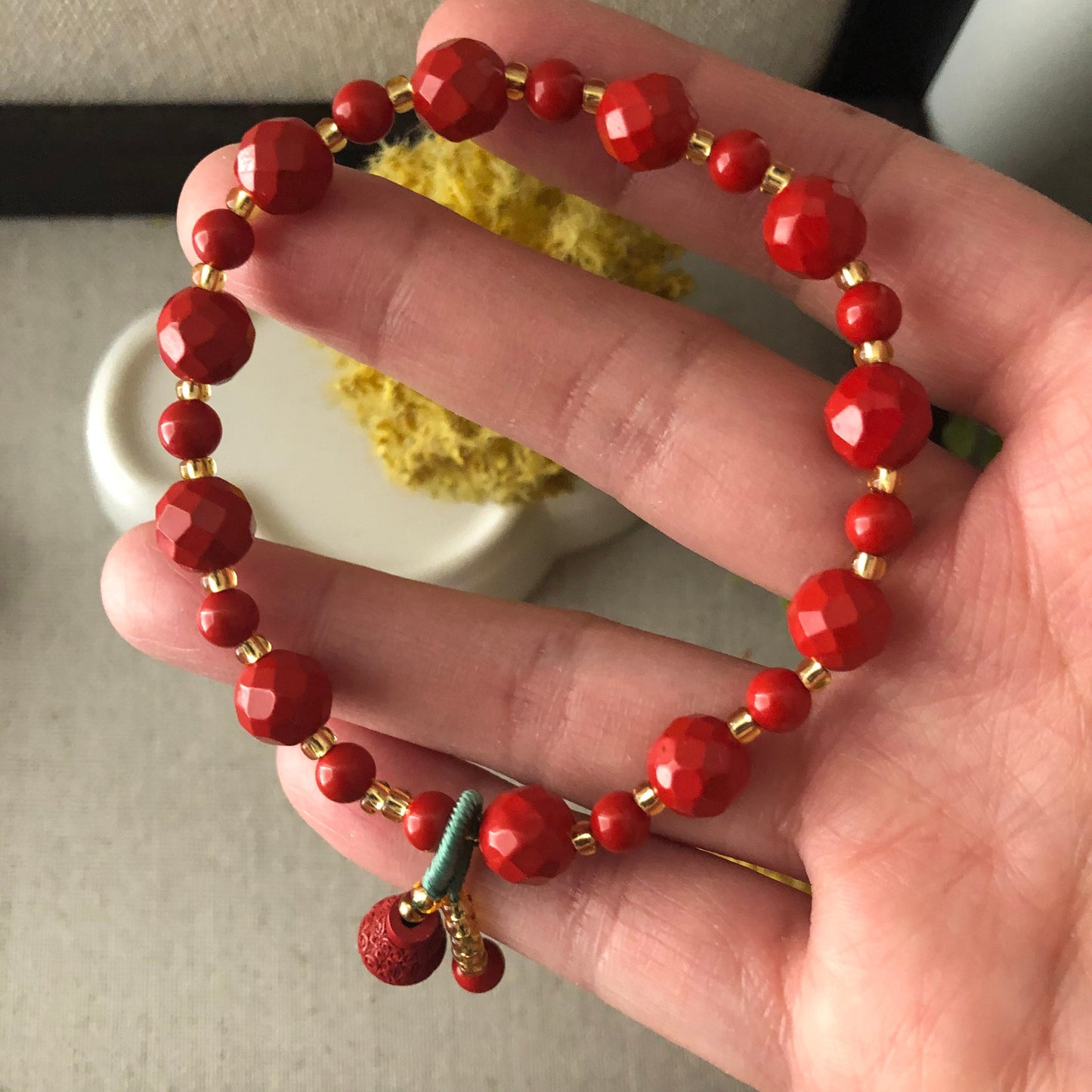 7 mm Red Crater Cut Cinnabar Bead Bracelet with Carved Gourd Charm