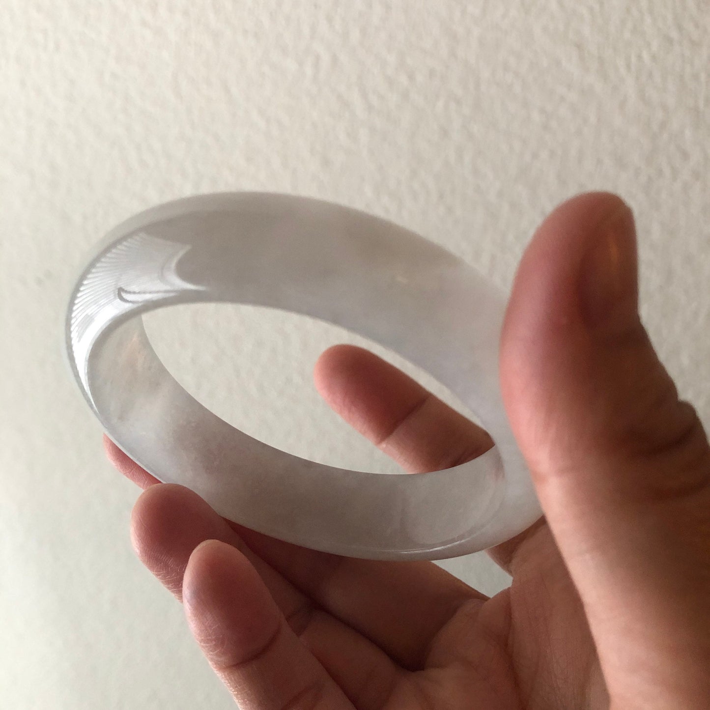 Reserved. 56mm Icy White Float Cotton Jadeite Jade Bangle