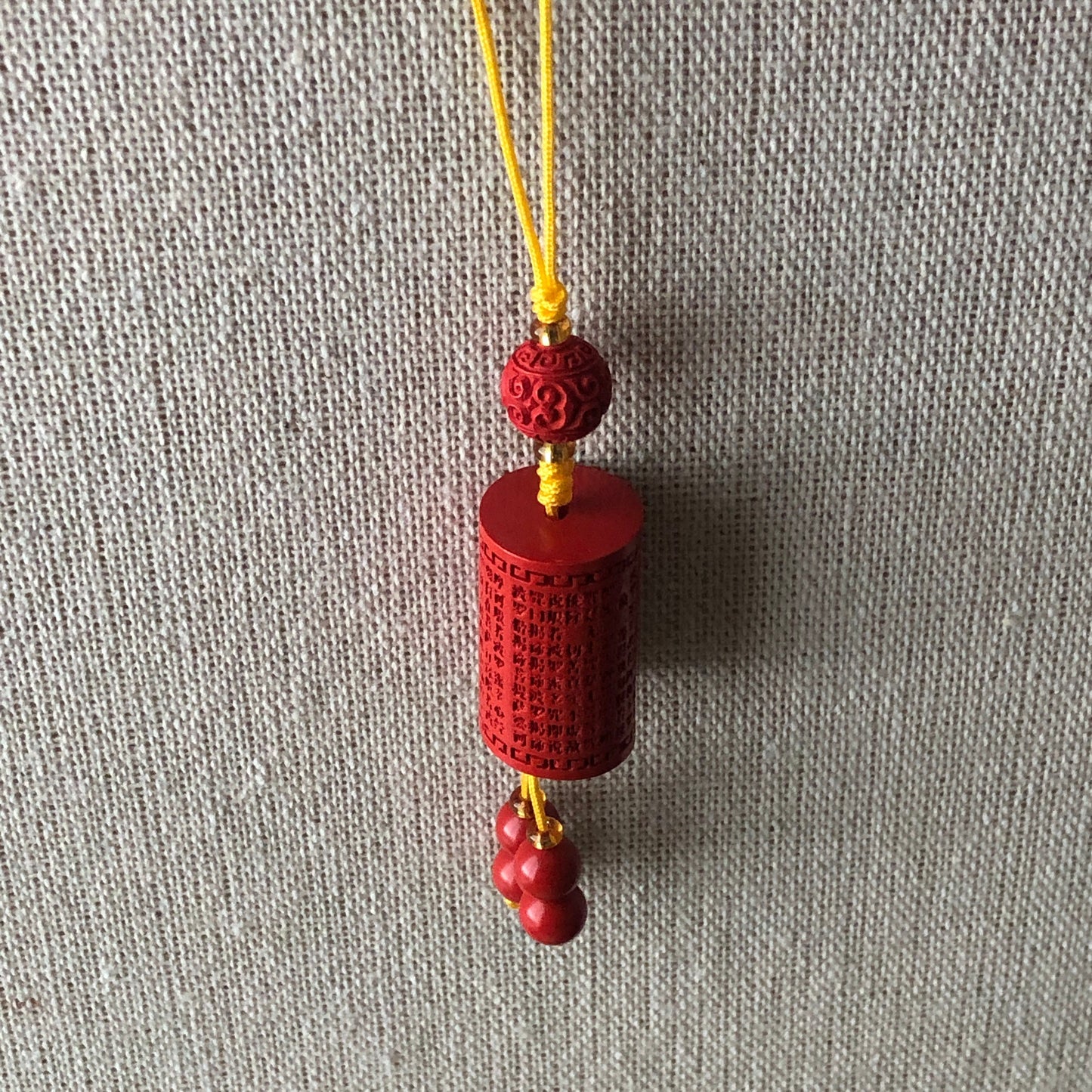 23.7 mm Cinnabar Carved Word Blessing Key Charm