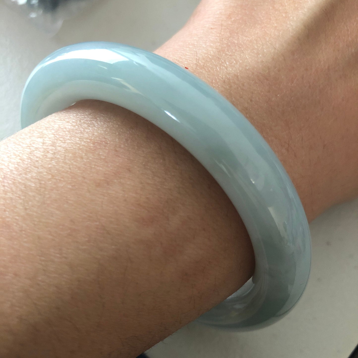 55.5-57 mm Icy Sky Blue Jadeite Jade Bangle