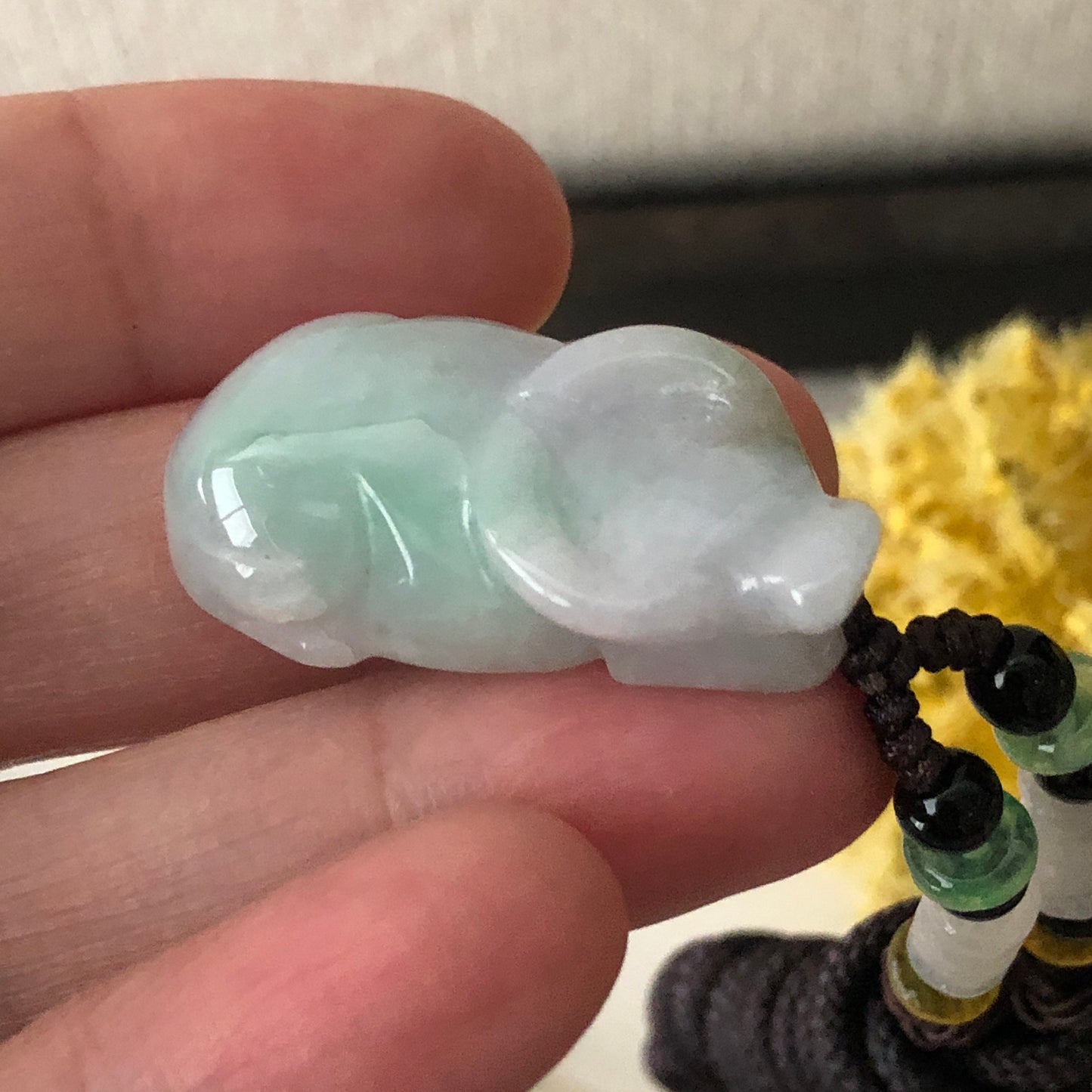 30mm Icy Green Jadeite Jade Cow Pendant Display