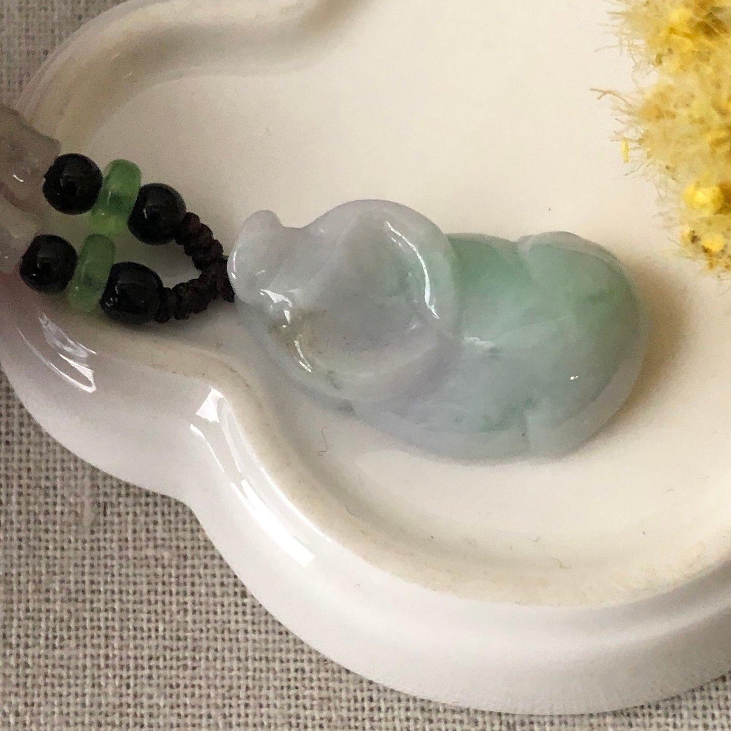 30mm Icy Green Jadeite Jade Cow Pendant Display