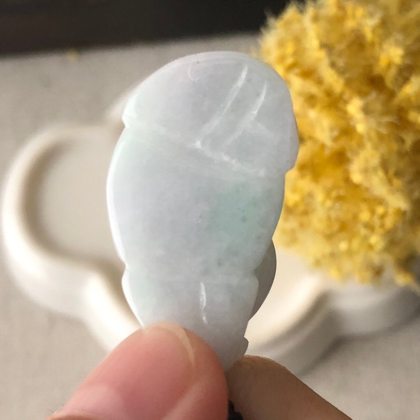 30mm Icy Green Jadeite Jade Cow Pendant Display