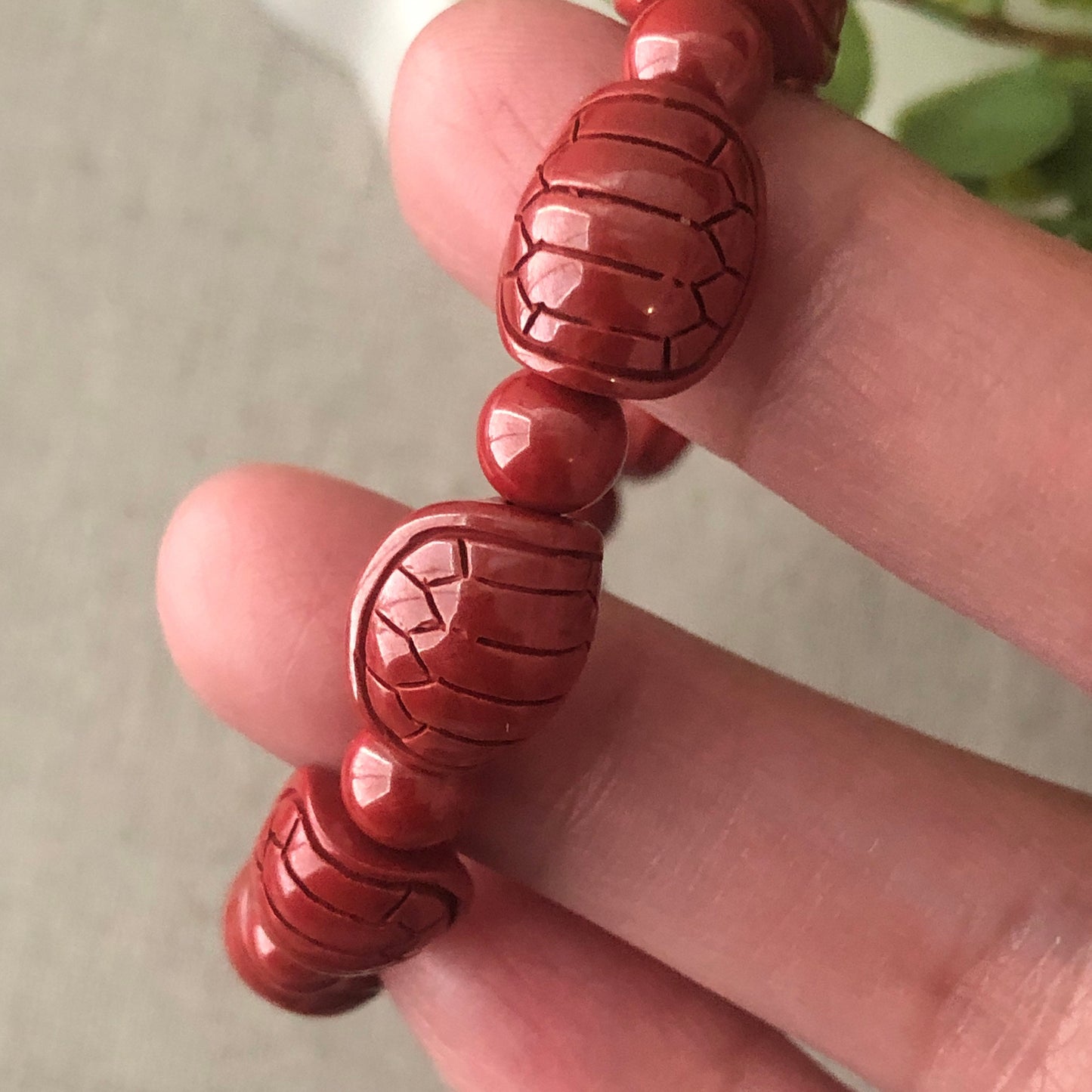 12.5 x 10.5 mm Cinnabar Bead Bracelet with Carved Turtle Shell