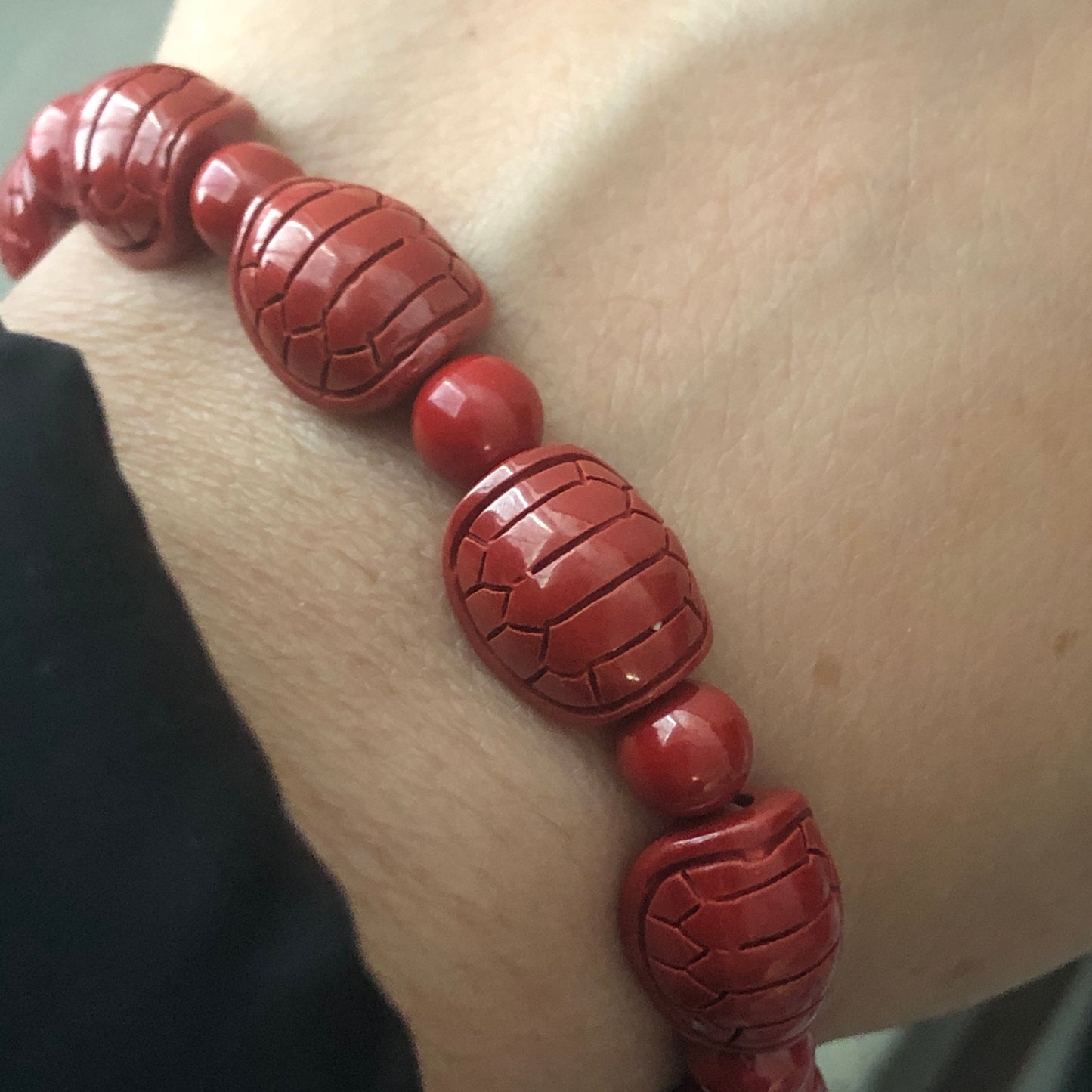 12.5 x 10.5 mm Cinnabar Bead Bracelet with Carved Turtle Shell