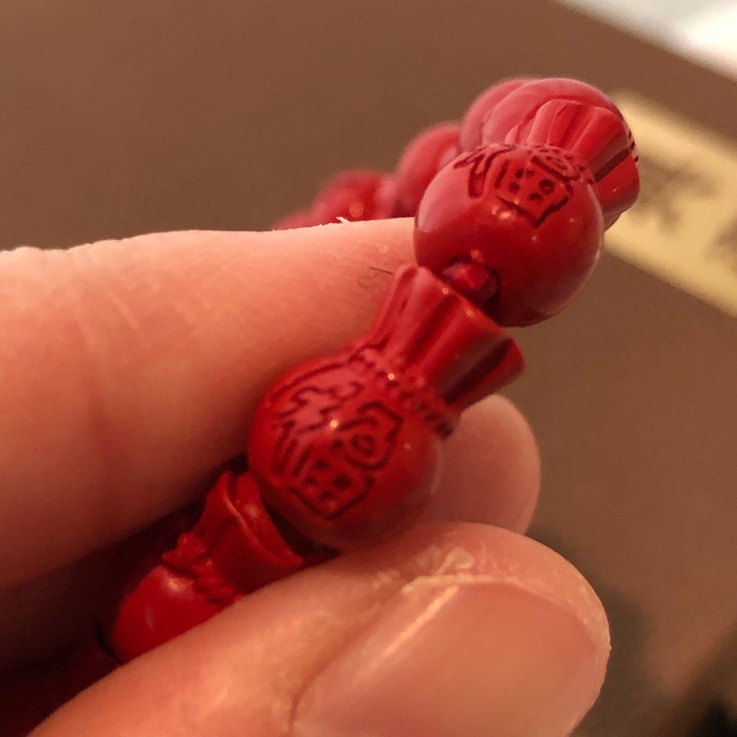 11.5x7.5 mm Cinnabar Carved Money Bag Bead Bracelet with Asian Fortune Character