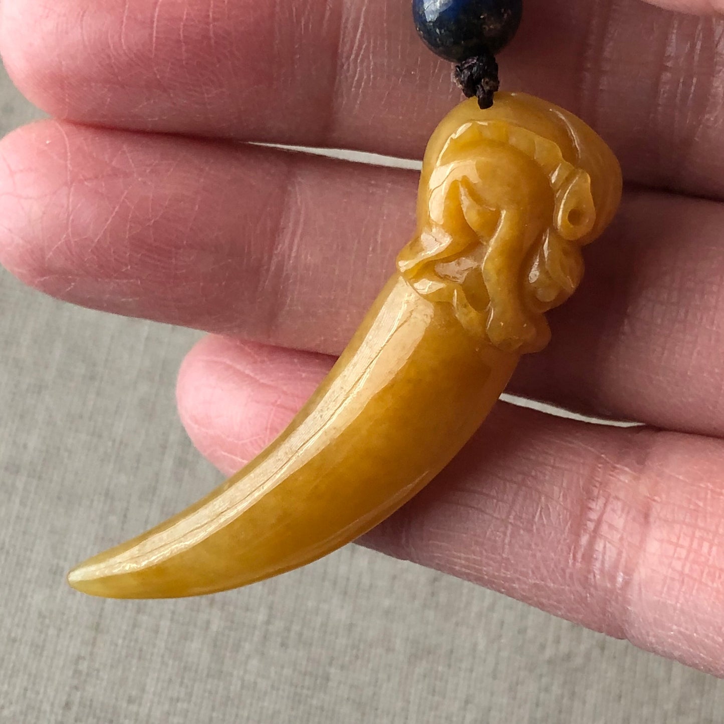49mm Icy Yellow Carved Dragon Tooth Jadeite Jade Pendant