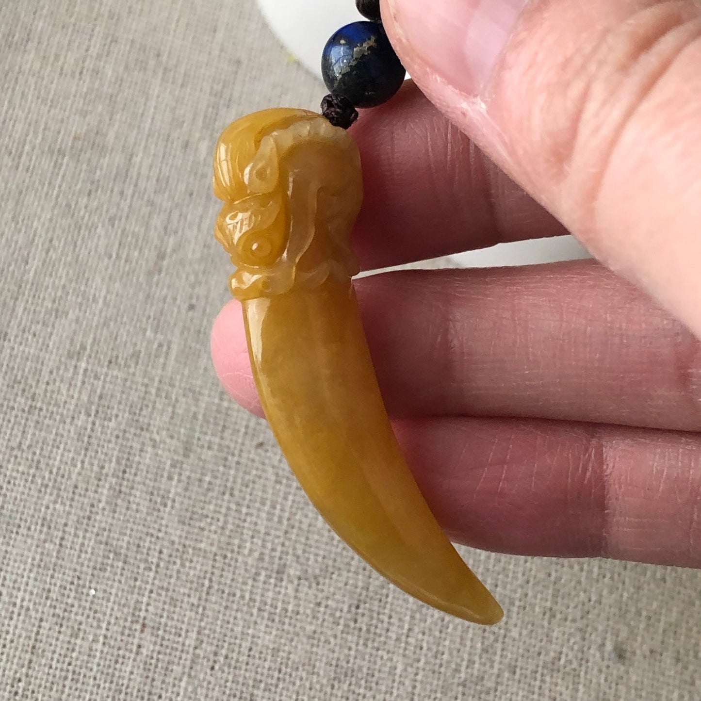 49mm Icy Yellow Carved Dragon Tooth Jadeite Jade Pendant
