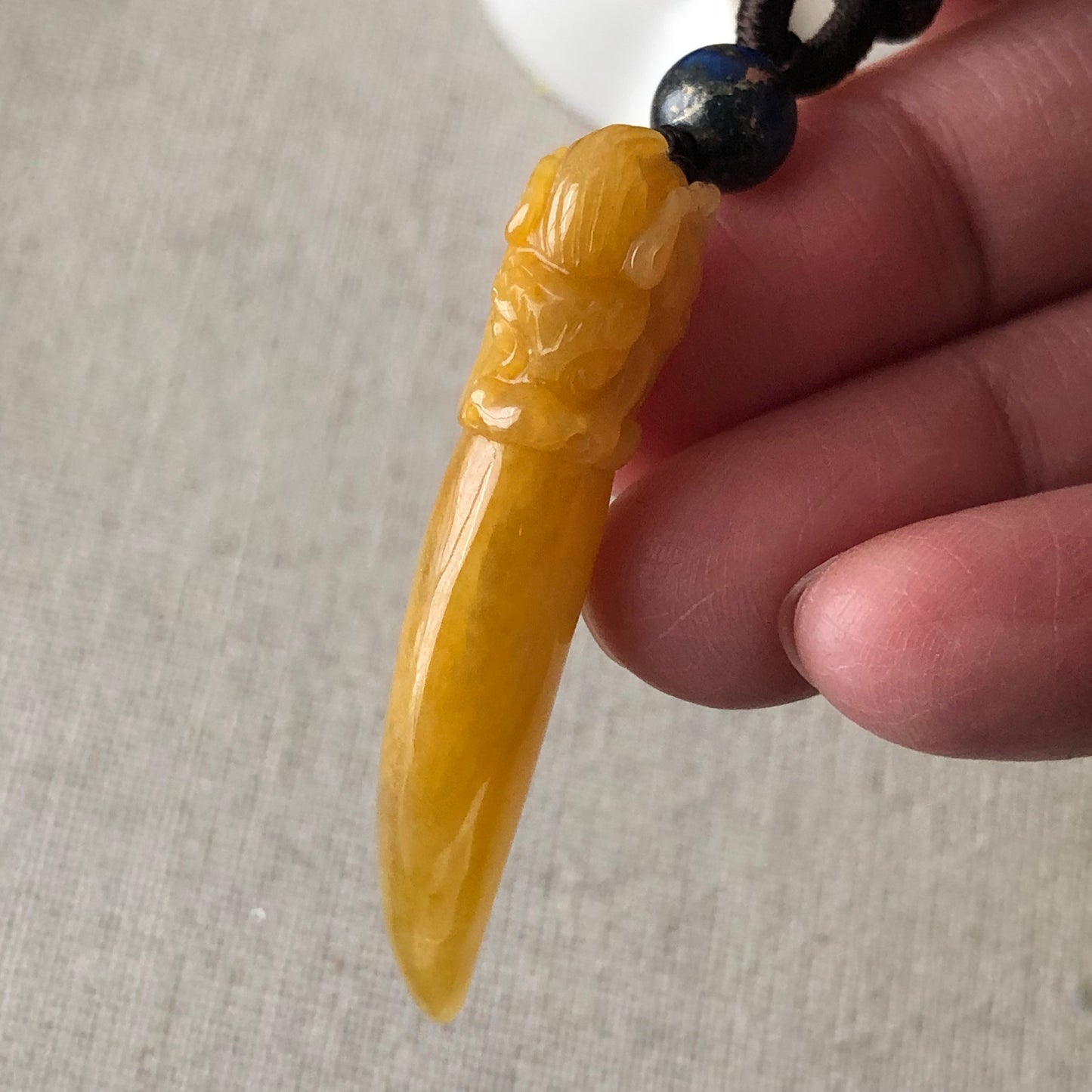 49mm Icy Yellow Carved Dragon Tooth Jadeite Jade Pendant