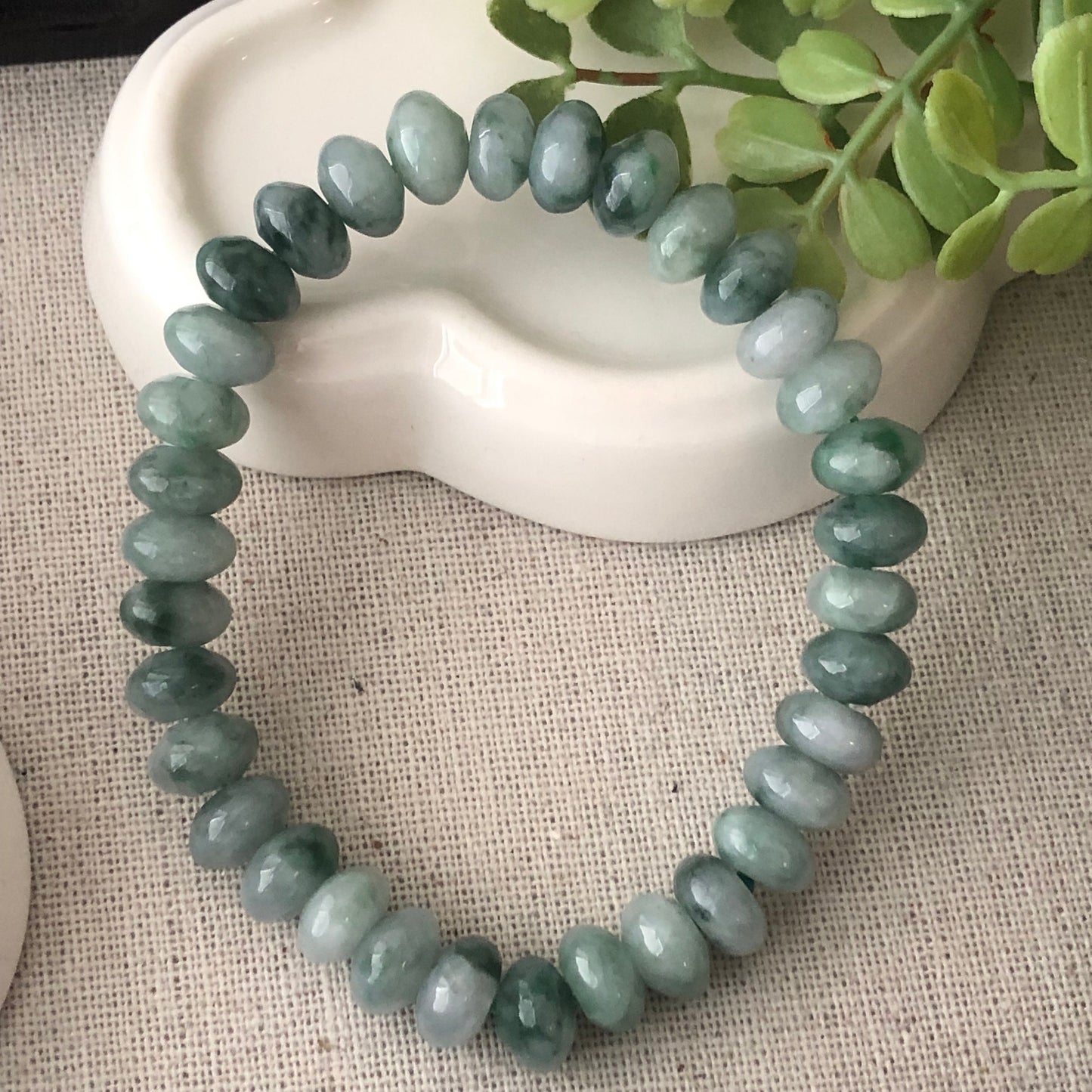 8.5mm Glossy Moist Green Float Flowers Jadeite Jade Flat Bead Bracelet