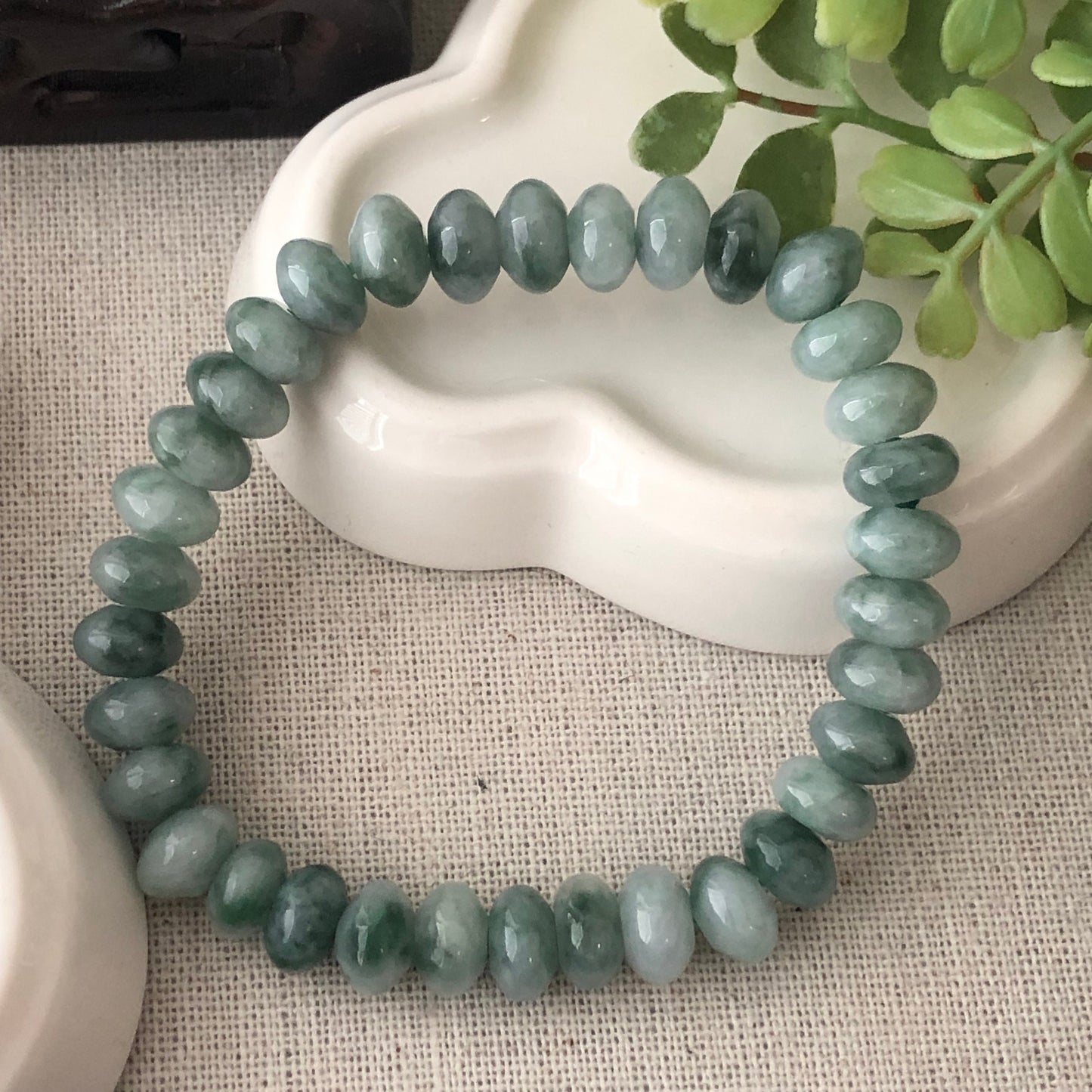 8.5mm Glossy Moist Green Float Flowers Jadeite Jade Flat Bead Bracelet