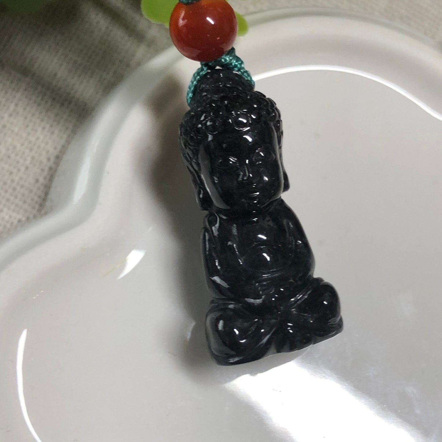 Carved Baby Buddha Grade A Wuji Black Jadeite Jade Pendant Display