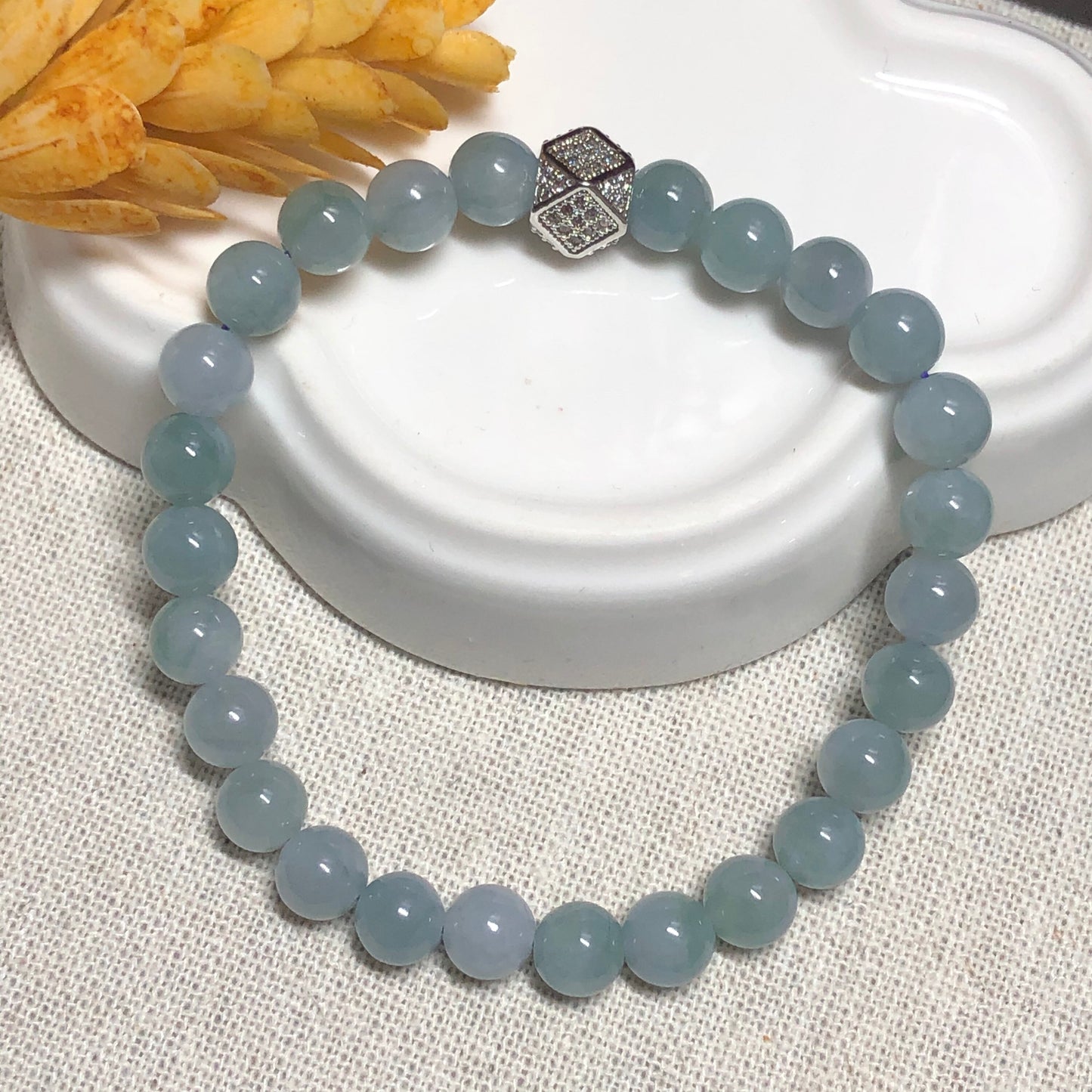 6.6 mm Grade A Icy Glutinous Sky Blue with Green Float Flowers Jadeite Jade Bead Bracelet 26 pcs.