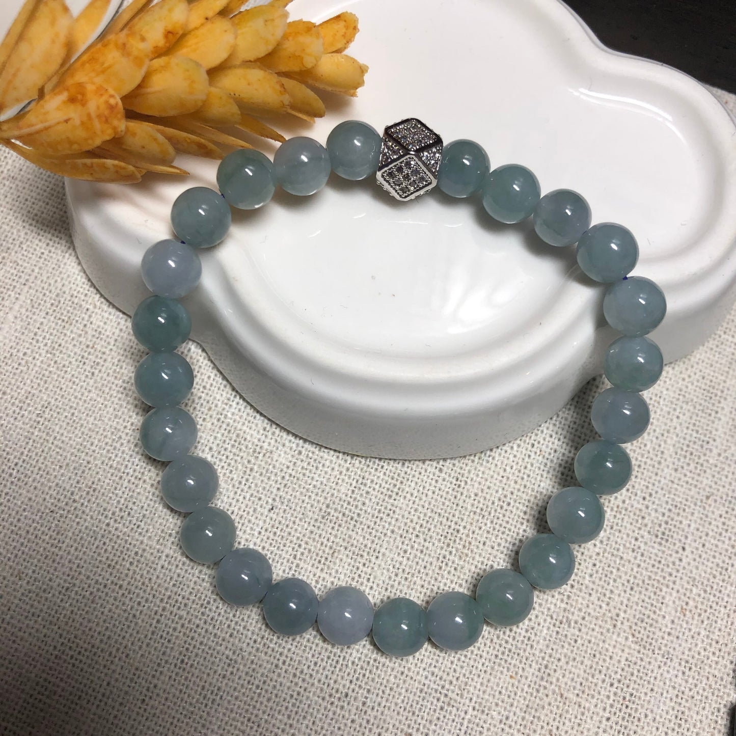 6.6 mm Grade A Icy Glutinous Sky Blue with Green Float Flowers Jadeite Jade Bead Bracelet 26 pcs.