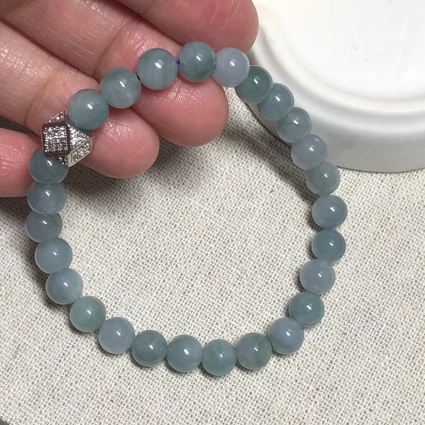 6.6 mm Grade A Icy Glutinous Sky Blue with Green Float Flowers Jadeite Jade Bead Bracelet 26 pcs.