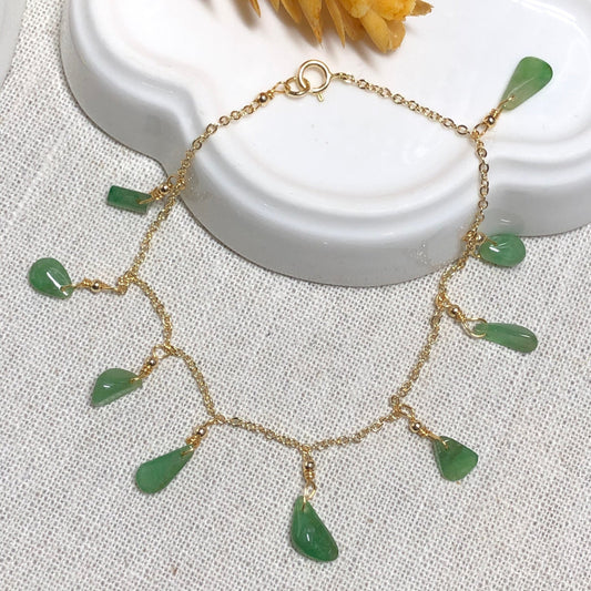14K Gold Grade A Asst Green Shape dropslets Icy Jade Jadeite Bracelet set on 14K gold.