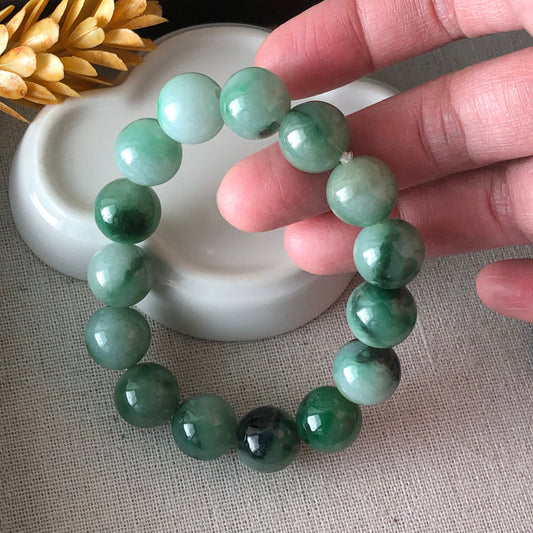 12mm Jade Jadeite Green Float Flowers Round Bead Bracelet 15pcs.