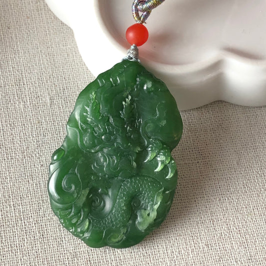 51.9 mm Glutinous Green Hetian Jade Carved Dragon Pendant