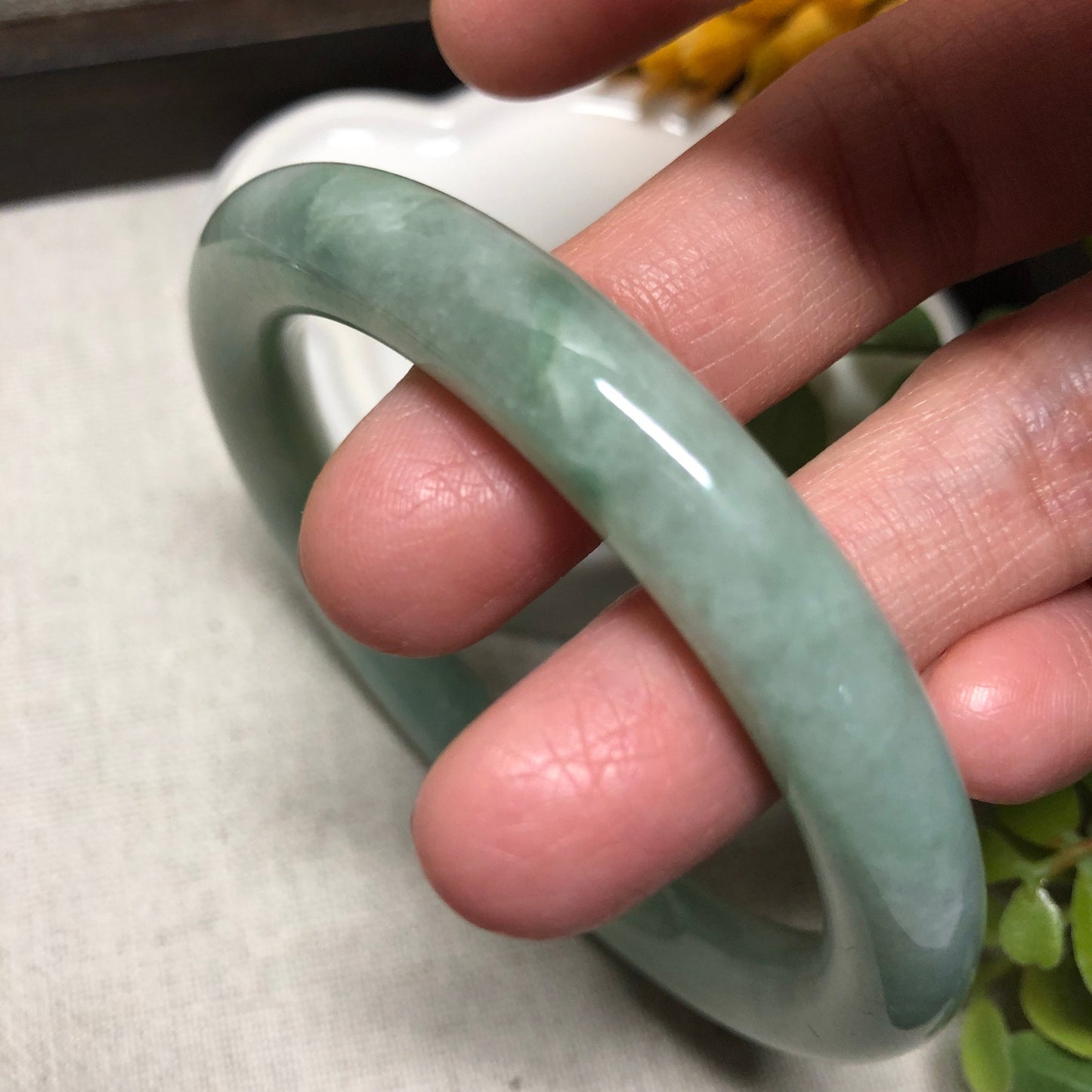 56.7-58.7mm Earthy Green Float Flowers Jadeite Jade Bangle