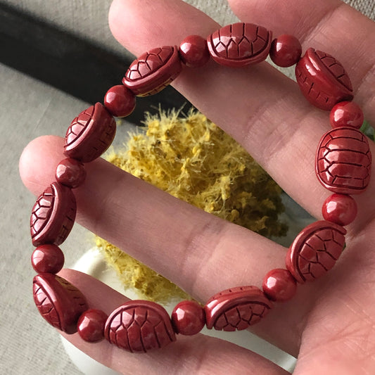 13 mm Cinnabar Bead Bracelet with Carved Turtle Shell
