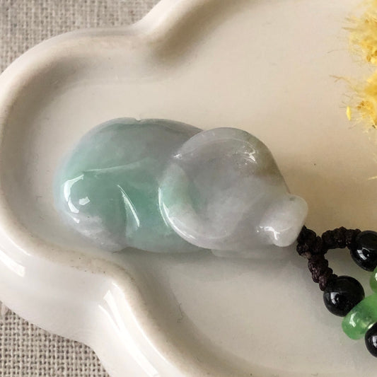 30mm Icy Green Jadeite Jade Cow Pendant Display