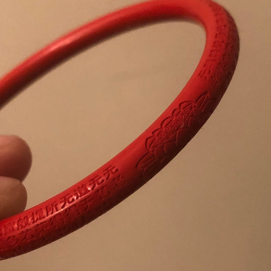56 mm Slim Red Cinnabar Bangle with Carved Six Word Blessing in the Outer side