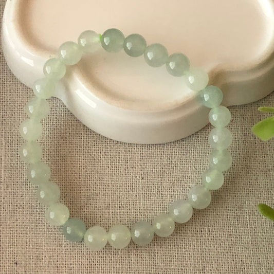 7mm Icy Glutinous Moist Tint Green Jadeite Jade Bead Bracelet