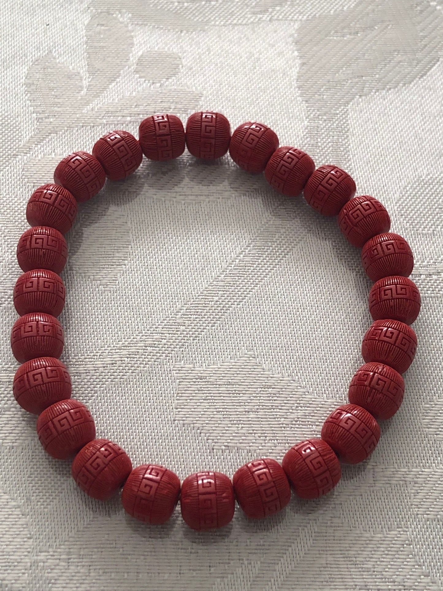8.1 mm Cinnabar Apple Shape Bead Bracelet with Carved Pattern