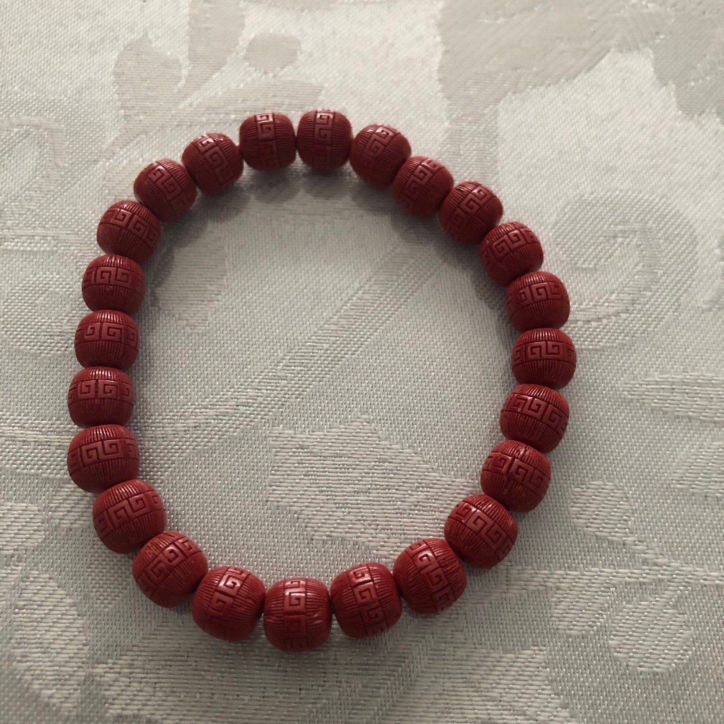 8.1 mm Cinnabar Apple Shape Bead Bracelet with Carved Pattern