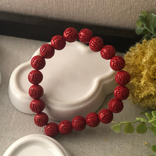 10.5 mm Cinnabar Carved Six Word Blessing Bead Bracelet