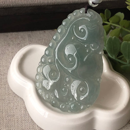 66.7mm Icy Green Carved Ruyi Clouds Jadeite Jade Pendant