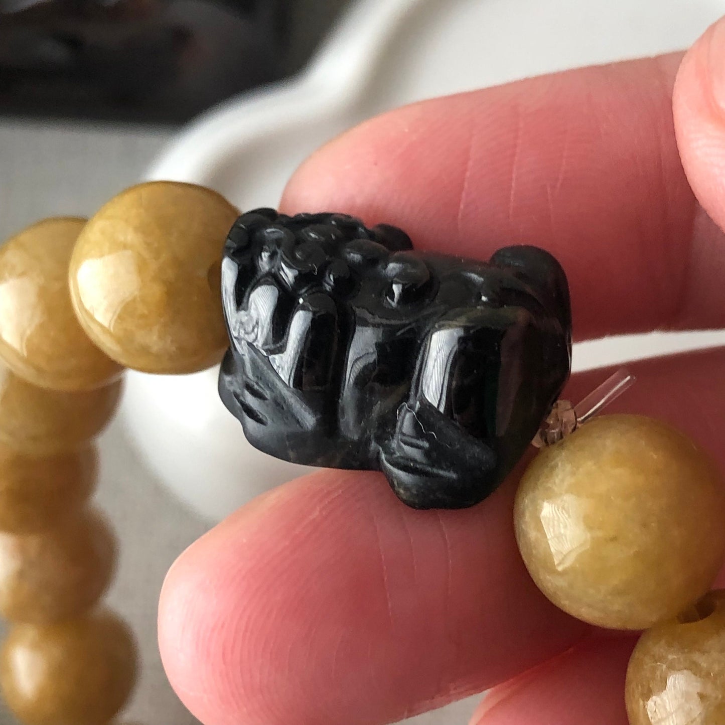 11 mm Earthy Glossy Yellow Brown Jadeite Jade Bead Bracelet with Carved Pixiu Bead