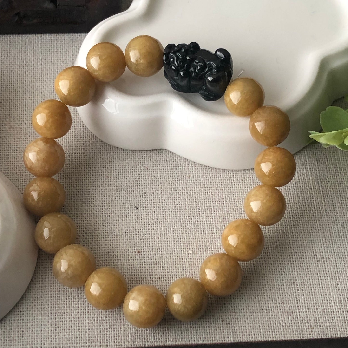 11 mm Earthy Glossy Yellow Brown Jadeite Jade Bead Bracelet with Carved Pixiu Bead