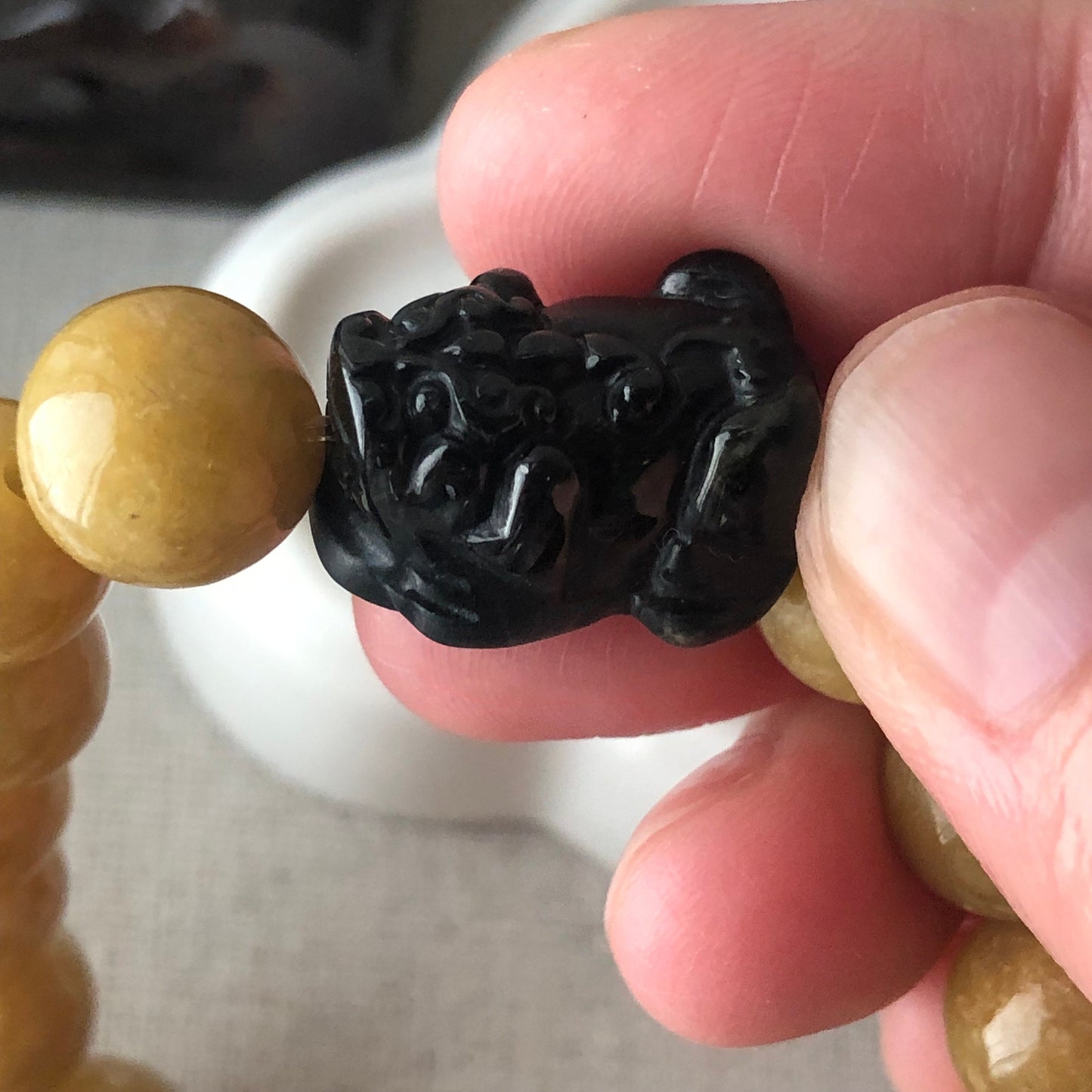 11 mm Earthy Glossy Yellow Brown Jadeite Jade Bead Bracelet with Carved Pixiu Bead