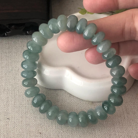 10 mm Icy Green Float Flowers Jade Jadeite Donut Bead Bracelet